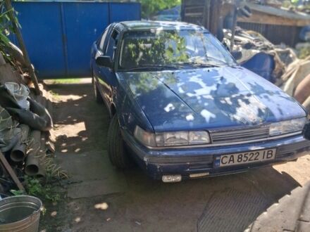 Синій Мазда 626, об'ємом двигуна 2 л та пробігом 300 тис. км за 850 $, фото 1 на Automoto.ua