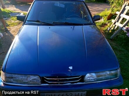 Мазда 626 1990 в Кривом Озере на Automoto.ua Синий Мазда 626, объемом двигателя 1.8 л и пробегом 300 тыс. км за 1000 $, фото 1 на Automoto.ua