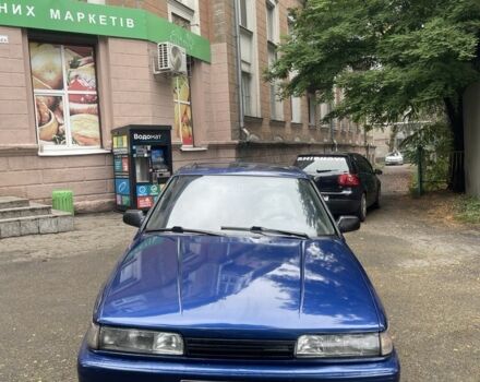 Синий Мазда 626, объемом двигателя 2 л и пробегом 400 тыс. км за 1098 $, фото 1 на Automoto.ua