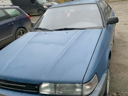 Синий Мазда 626, объемом двигателя 1.8 л и пробегом 500 тыс. км за 284 $, фото 1 на Automoto.ua