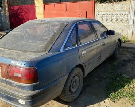 Синий Мазда 626, объемом двигателя 2 л и пробегом 3 тыс. км за 597 $, фото 1 на Automoto.ua