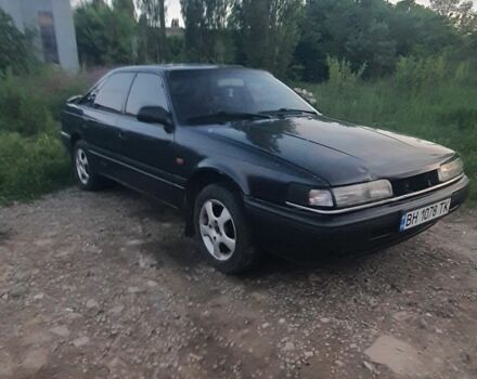 Синій Мазда 626, об'ємом двигуна 1.8 л та пробігом 200 тис. км за 1088 $, фото 1 на Automoto.ua