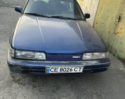 Синий Мазда 626, объемом двигателя 2 л и пробегом 500 тыс. км за 969 $, фото 1 на Automoto.ua