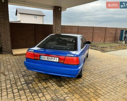 Синий Мазда 626, объемом двигателя 2.2 л и пробегом 385 тыс. км за 1150 $, фото 1 на Automoto.ua