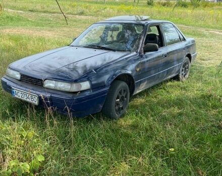 Синий Мазда 626, объемом двигателя 2 л и пробегом 200 тыс. км за 289 $, фото 1 на Automoto.ua
