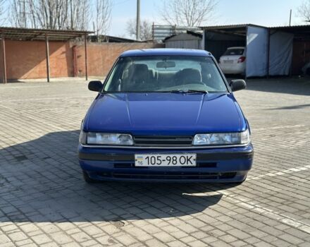 Синий Мазда 626, объемом двигателя 2 л и пробегом 360 тыс. км за 1500 $, фото 1 на Automoto.ua