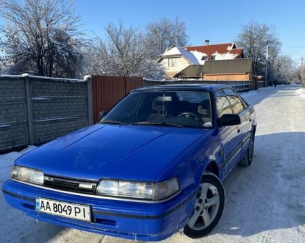 Синий Мазда 626, объемом двигателя 2.2 л и пробегом 384 тыс. км за 1300 $, фото 1 на Automoto.ua