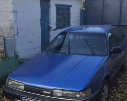 Синий Мазда 626, объемом двигателя 2 л и пробегом 333 тыс. км за 600 $, фото 1 на Automoto.ua