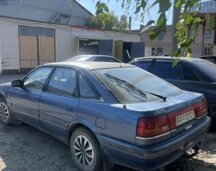 Синий Мазда 626, объемом двигателя 2 л и пробегом 300 тыс. км за 1300 $, фото 1 на Automoto.ua