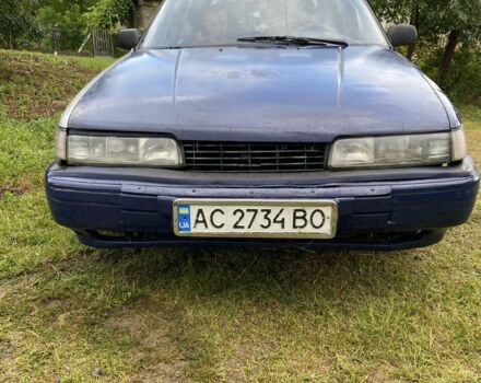 Синий Мазда 626, объемом двигателя 2 л и пробегом 1 тыс. км за 650 $, фото 1 на Automoto.ua