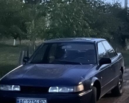 Синий Мазда 626, объемом двигателя 2 л и пробегом 280 тыс. км за 301 $, фото 1 на Automoto.ua