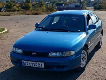 Синій Мазда 626, об'ємом двигуна 2 л та пробігом 400 тис. км за 2000 $, фото 1 на Automoto.ua