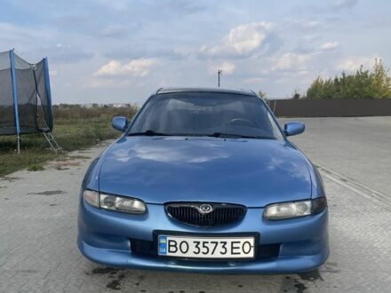 Синий Мазда 626, объемом двигателя 2 л и пробегом 1000 тыс. км за 1003 $, фото 1 на Automoto.ua