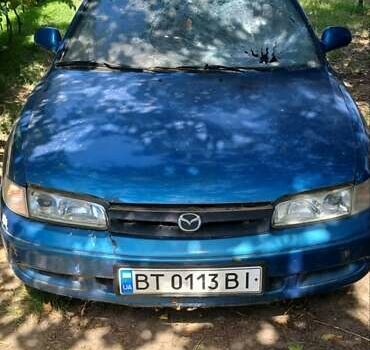 Синий Мазда 626, объемом двигателя 1.99 л и пробегом 300 тыс. км за 1000 $, фото 1 на Automoto.ua