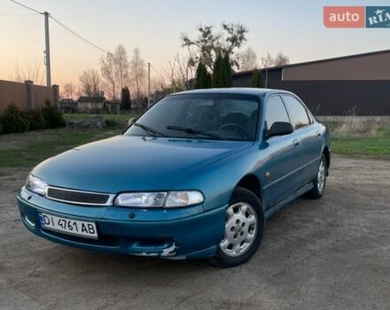 Синий Мазда 626, объемом двигателя 1.8 л и пробегом 500 тыс. км за 1200 $, фото 1 на Automoto.ua