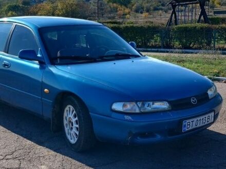 Синий Мазда 626, объемом двигателя 2 л и пробегом 300 тыс. км за 1500 $, фото 1 на Automoto.ua