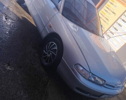 Синий Мазда 626, объемом двигателя 2 л и пробегом 121 тыс. км за 1999 $, фото 1 на Automoto.ua