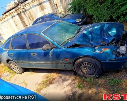 Синий Мазда 626, объемом двигателя 2 л и пробегом 325 тыс. км за 650 $, фото 1 на Automoto.ua