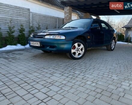 Синий Мазда 626, объемом двигателя 2 л и пробегом 327 тыс. км за 1250 $, фото 1 на Automoto.ua