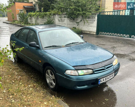 Синий Мазда 626, объемом двигателя 2 л и пробегом 323 тыс. км за 1400 $, фото 1 на Automoto.ua