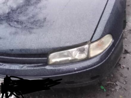 Синий Мазда 626, объемом двигателя 1.9 л и пробегом 3 тыс. км за 1000 $, фото 1 на Automoto.ua