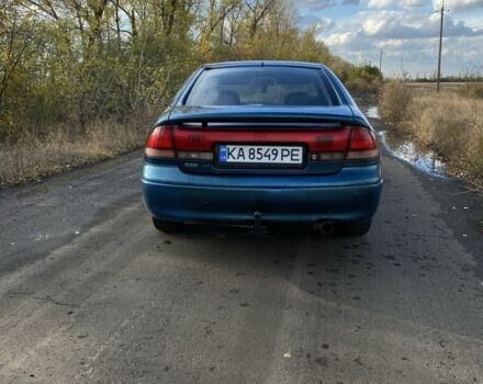 Синий Мазда 626, объемом двигателя 2 л и пробегом 325 тыс. км за 1790 $, фото 1 на Automoto.ua