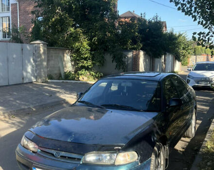 Синій Мазда 626, об'ємом двигуна 2 л та пробігом 323 тис. км за 1400 $, фото 1 на Automoto.ua