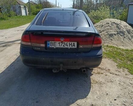 Синий Мазда 626, объемом двигателя 1.8 л и пробегом 200 тыс. км за 1000 $, фото 1 на Automoto.ua