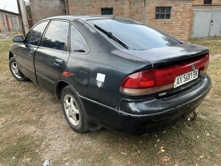 Синий Мазда 626, объемом двигателя 2 л и пробегом 705 тыс. км за 1750 $, фото 1 на Automoto.ua
