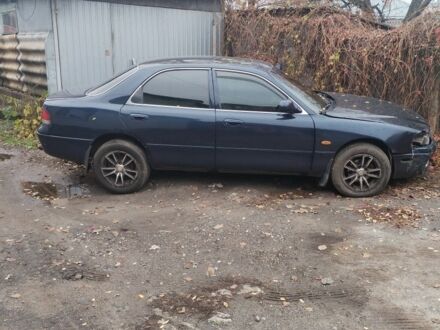 Синій Мазда 626, об'ємом двигуна 2 л та пробігом 400 тис. км за 952 $, фото 1 на Automoto.ua