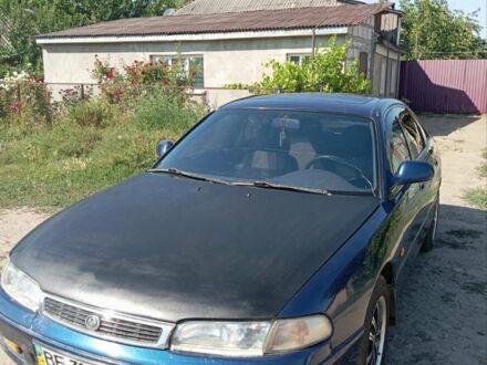 Синій Мазда 626, об'ємом двигуна 1.8 л та пробігом 300 тис. км за 2100 $, фото 1 на Automoto.ua