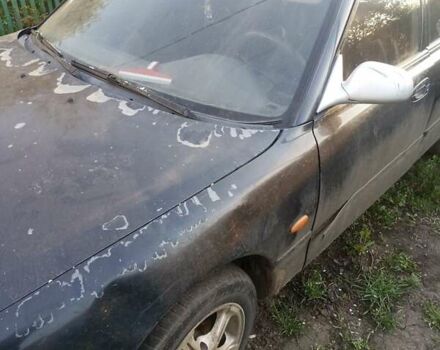 Синий Мазда 626, объемом двигателя 2 л и пробегом 404 тыс. км за 500 $, фото 1 на Automoto.ua
