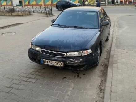 Синий Мазда 626, объемом двигателя 1.8 л и пробегом 500 тыс. км за 800 $, фото 1 на Automoto.ua
