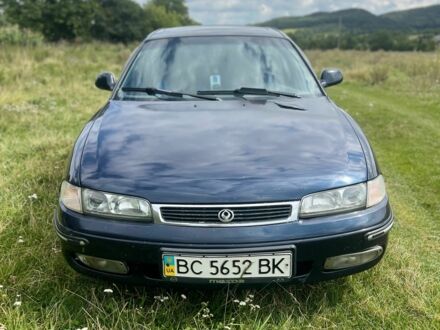 Синий Мазда 626, объемом двигателя 2 л и пробегом 400 тыс. км за 3000 $, фото 1 на Automoto.ua