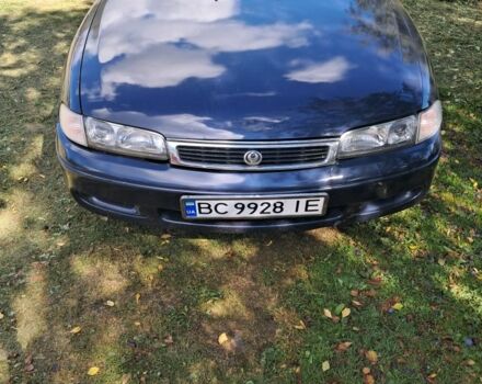 Синий Мазда 626, объемом двигателя 1.8 л и пробегом 259 тыс. км за 954 $, фото 1 на Automoto.ua