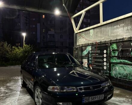 Синий Мазда 626, объемом двигателя 1.8 л и пробегом 417 тыс. км за 1900 $, фото 1 на Automoto.ua