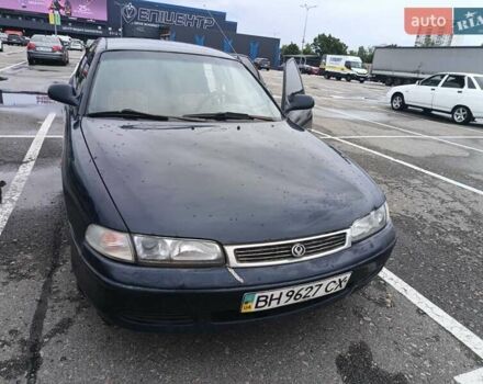 Синий Мазда 626, объемом двигателя 1.84 л и пробегом 394 тыс. км за 1200 $, фото 1 на Automoto.ua