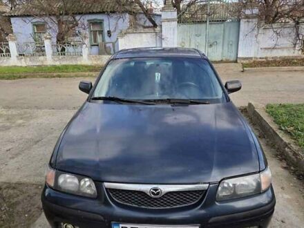 Синій Мазда 626, об'ємом двигуна 2 л та пробігом 305 тис. км за 2300 $, фото 1 на Automoto.ua