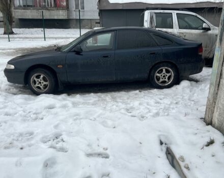 Синий Мазда 626, объемом двигателя 1.8 л и пробегом 350 тыс. км за 1900 $, фото 1 на Automoto.ua