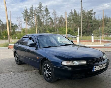 Синій Мазда 626, об'ємом двигуна 1.8 л та пробігом 200 тис. км за 1101 $, фото 1 на Automoto.ua