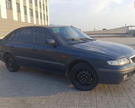 Синий Мазда 626, объемом двигателя 1.8 л и пробегом 418 тыс. км за 3000 $, фото 1 на Automoto.ua