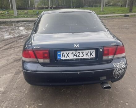 Синий Мазда 626, объемом двигателя 2 л и пробегом 427 тыс. км за 1000 $, фото 1 на Automoto.ua