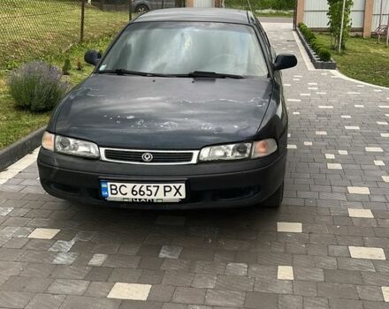 Синий Мазда 626, объемом двигателя 1.8 л и пробегом 350 тыс. км за 1750 $, фото 1 на Automoto.ua