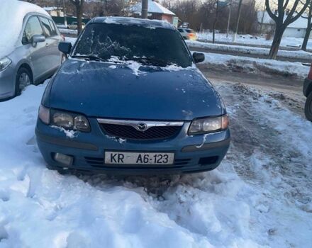 Синий Мазда 626, объемом двигателя 2 л и пробегом 222 тыс. км за 700 $, фото 1 на Automoto.ua