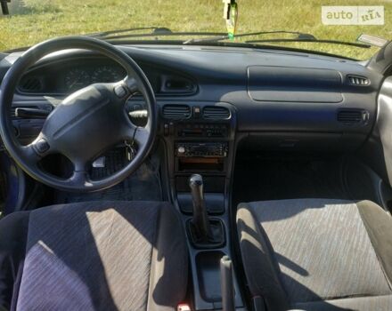 Синий Мазда 626, объемом двигателя 1.84 л и пробегом 420 тыс. км за 1200 $, фото 1 на Automoto.ua