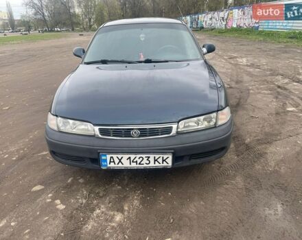 Синий Мазда 626, объемом двигателя 2 л и пробегом 432 тыс. км за 670 $, фото 1 на Automoto.ua