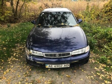 Синій Мазда 626, об'ємом двигуна 1.8 л та пробігом 214 тис. км за 599 $, фото 1 на Automoto.ua