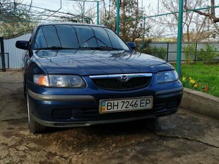 Синій Мазда 626, об'ємом двигуна 2 л та пробігом 222 тис. км за 4400 $, фото 1 на Automoto.ua