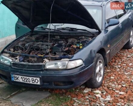 Синий Мазда 626, объемом двигателя 1.8 л и пробегом 430 тыс. км за 1000 $, фото 1 на Automoto.ua