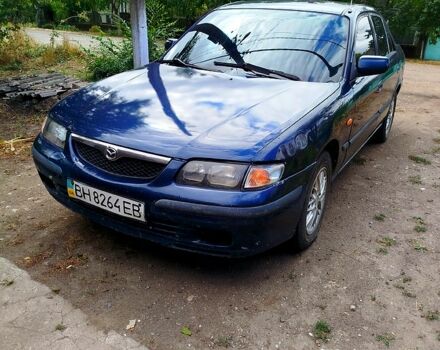 Синий Мазда 626, объемом двигателя 1.8 л и пробегом 88 тыс. км за 1750 $, фото 1 на Automoto.ua